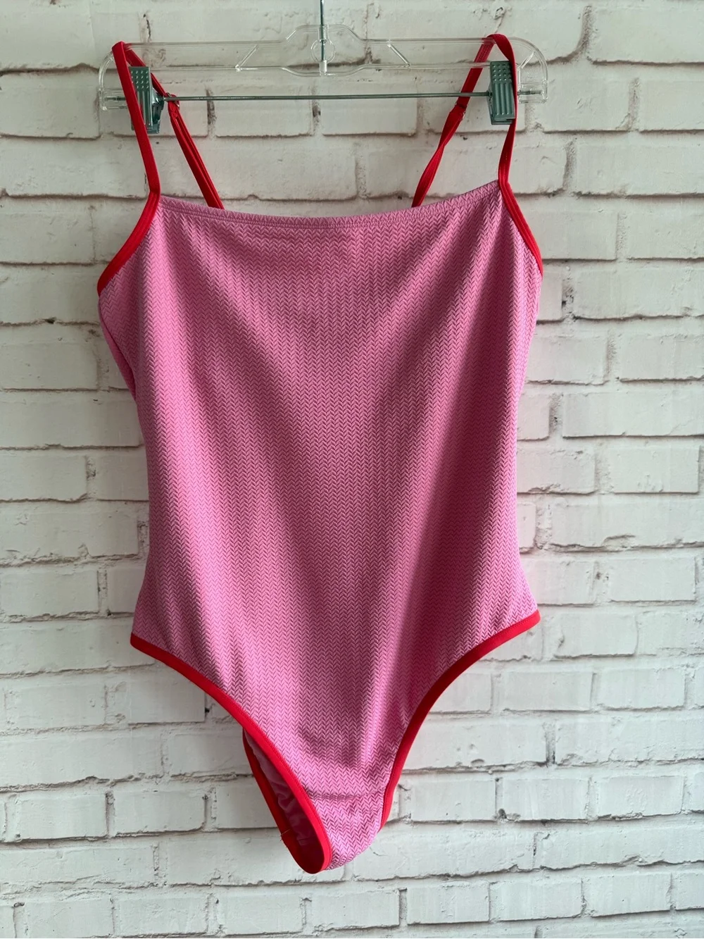 Pink One-Piece Swimsuit with Red Trim